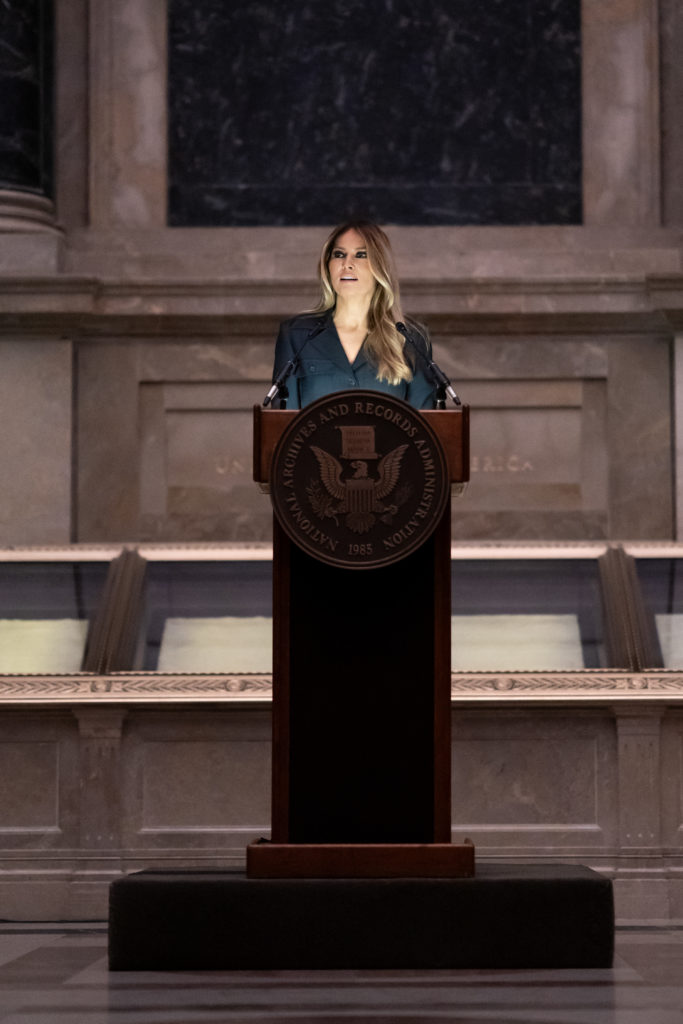 Former First Lady of the United States Melania Trump speaks in the Rotunda of the National Archives during a naturalization ceremony held on December 15, 2023. (Courtesy Photo by Andrea Hanks)