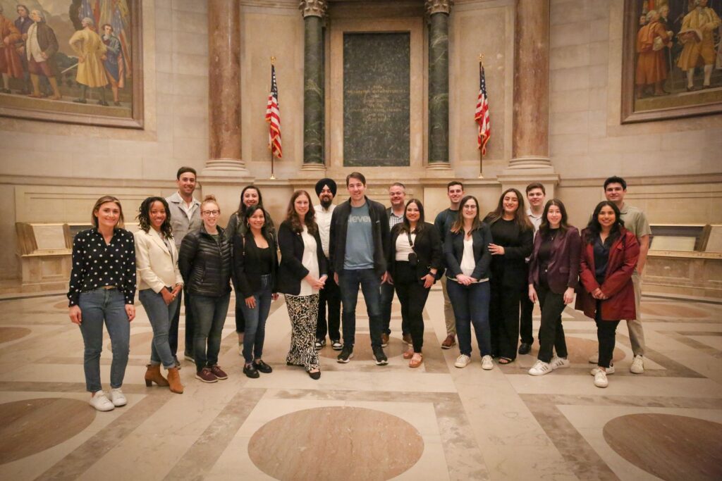 On May 10, Dr. Shogan (center left, black cardigan and patterned pants) met with Congressman Josh Harder (D-CA) (center, blue shirt and black jacket) and his staff during a tour of the National Archives Rotunda. National Archives photo by Susana Raab.