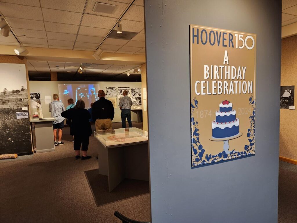 Tour group visiting Hoover 150: A Birthday Celebration. Photo courtesy of the Herbert Hoover Presidential Library and Museum.

