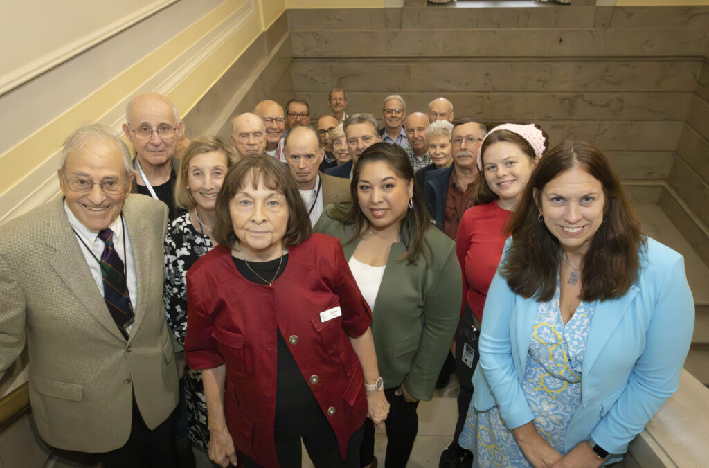 On September 23, 2024, Archivist of the United States Dr. Colleen J. Shogan posed for a photo with volunteers after giving remarks at the Volunteer Appreciation Event held in the Archivist's Reception Room at the National Archives in Washington, DC.