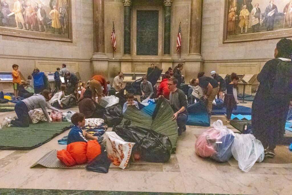 On October 19, 2024, Archivist of the United States Dr. Colleen Shogan welcomed more than 100 guests who participated in the National Archives Sleepover at the National Archives Building in Washington, DC. Read more about the sleepover here. Children between the ages of 8 and 12 and their chaperones experience the rare opportunity to sleep beside the Declaration of Independence, the Constitution of the United States, and the Bill of Rights. The following morning, they are treated to a pancake breakfast served by the Archivist of the United States. 🥞 National Archives photo by Susana Raab.